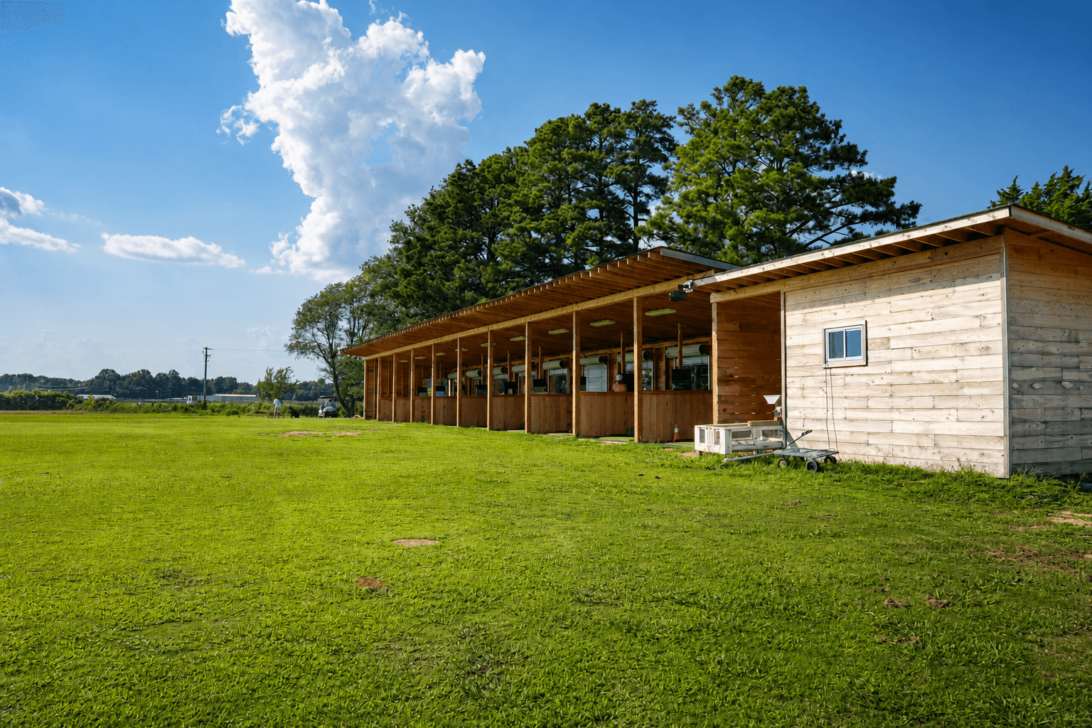 The Hangar exterior — covered Toptracer driving range at High Pointe